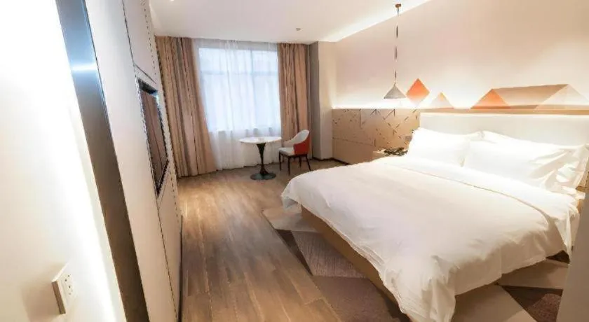 Bed in Borrman Hotel Yongzhou High Speed Railway Station