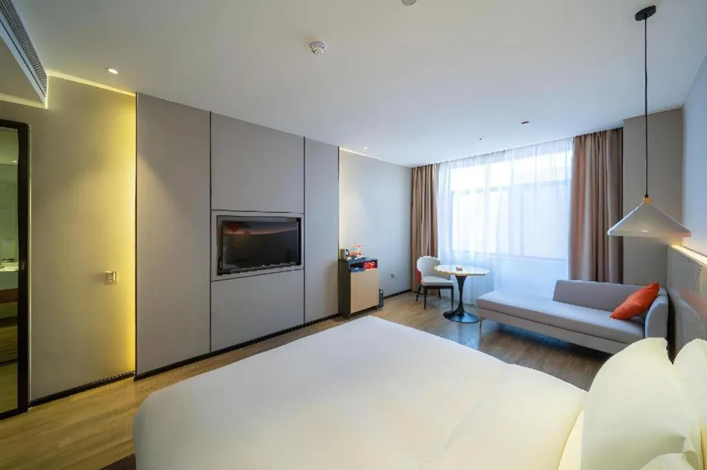 Bed in Borrman Hotel Yongzhou High Speed Railway Station