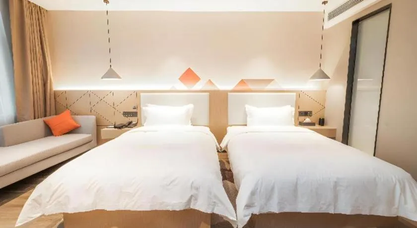 Bed in Borrman Hotel Yongzhou High Speed Railway Station