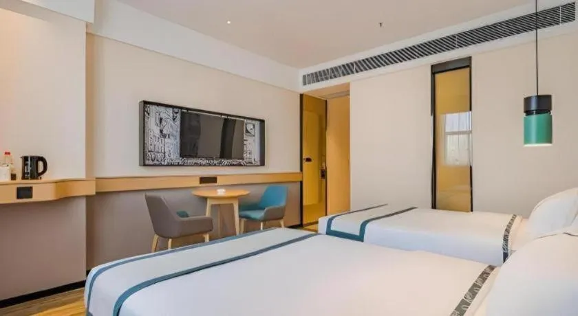 Bed in City Comfort Inn Hotel Dongguan Humen Pedestrian Street