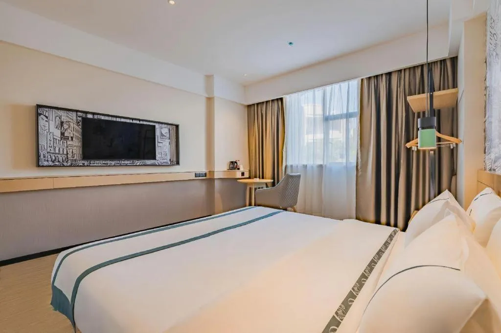 Bed in City Comfort Inn Hotel Dongguan Humen Pedestrian Street