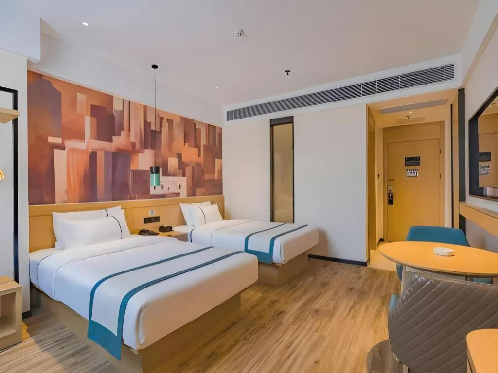 Bed in City Comfort Inn Hotel Dongguan Humen Pedestrian Street