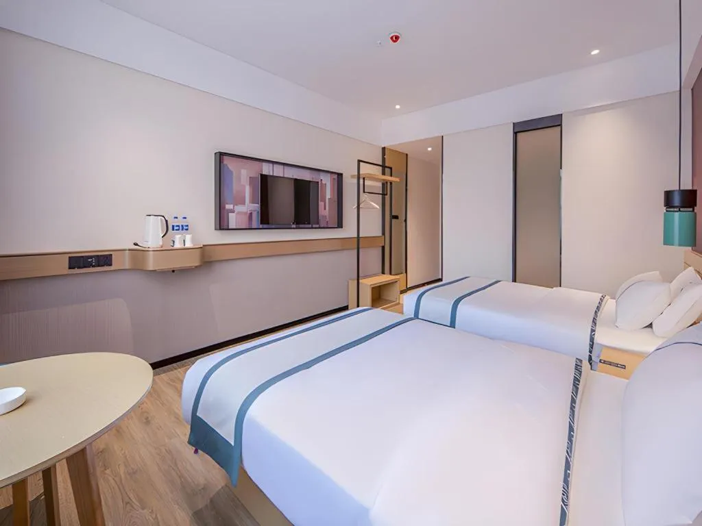 Bed in City Comfort Inn Fangchenggang Government Affairs Center