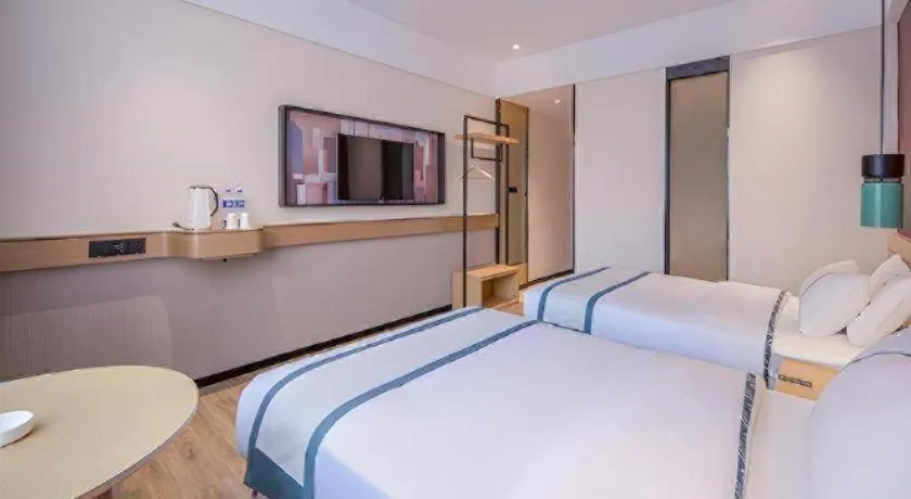 Bed in City Comfort Inn Fangchenggang Government Affairs Center