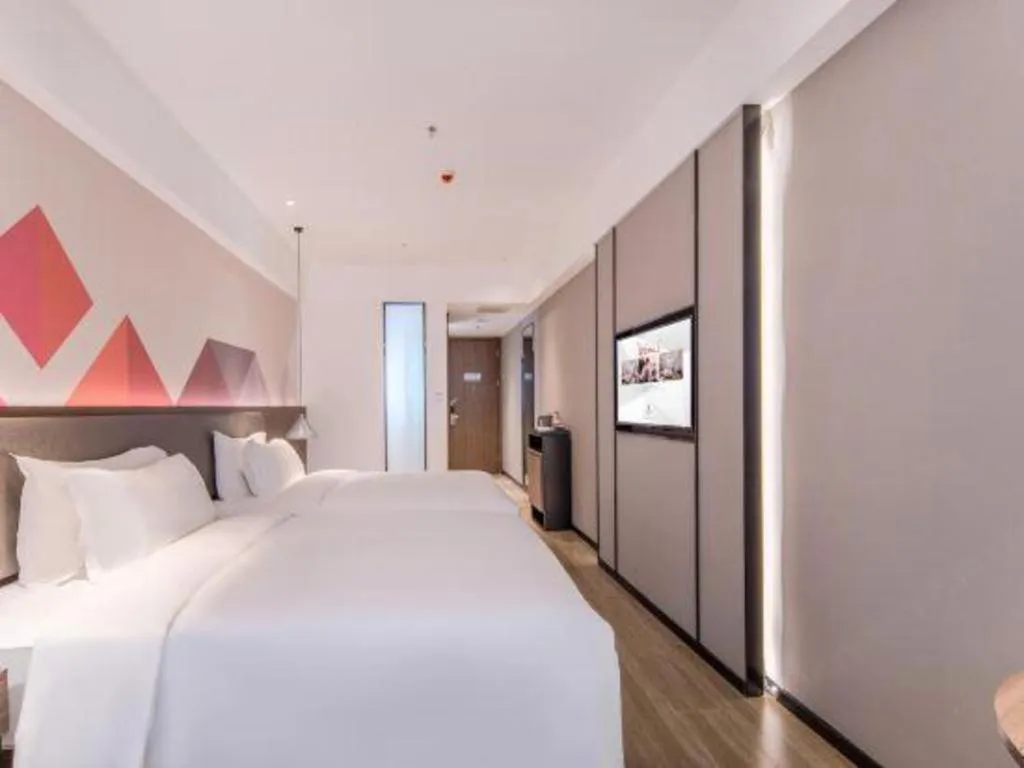 Bed in Borrman Hotel Hezhou High Speed Railway Station Guangming Avenue