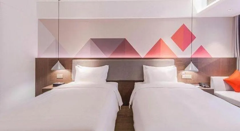 Bed in Borrman Hotel Hezhou High Speed Railway Station Guangming Avenue