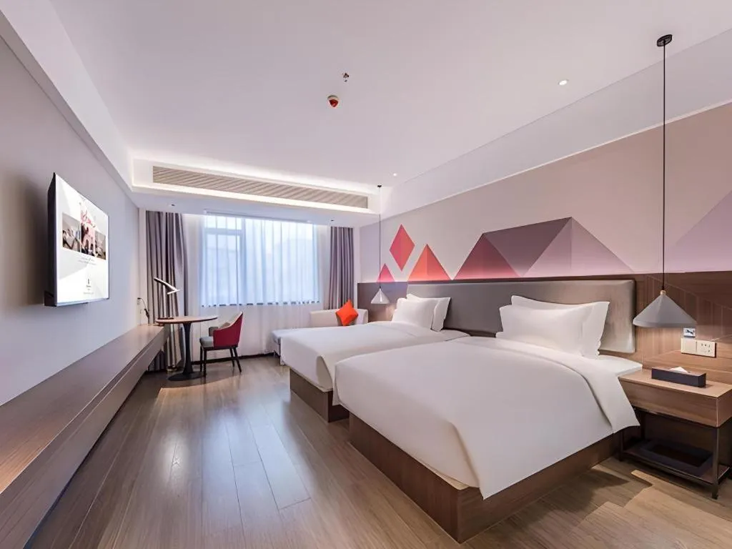 Bed in Borrman Hotel Hezhou High Speed Railway Station Guangming Avenue
