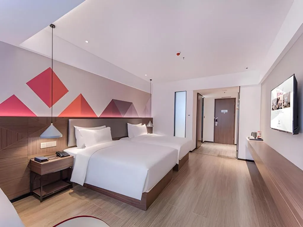 Bed in Borrman Hotel Hezhou High Speed Railway Station Guangming Avenue