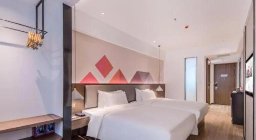 Bed in Borrman Hotel Hezhou High Speed Railway Station Guangming Avenue