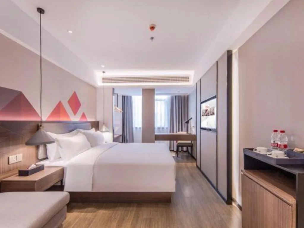 Bed in Borrman Hotel Hezhou High Speed Railway Station Guangming Avenue
