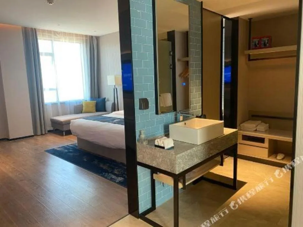 Bed in Echarm Hotel Fangchenggang Qisha