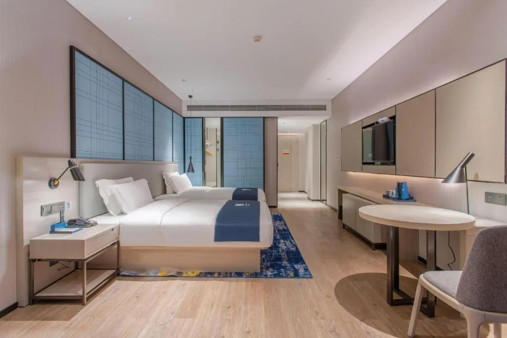 Bed in Echarm Hotel Fangchenggang Qisha