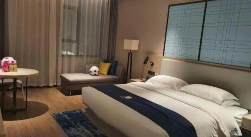 Bed in Echarm Hotel Fangchenggang Qisha