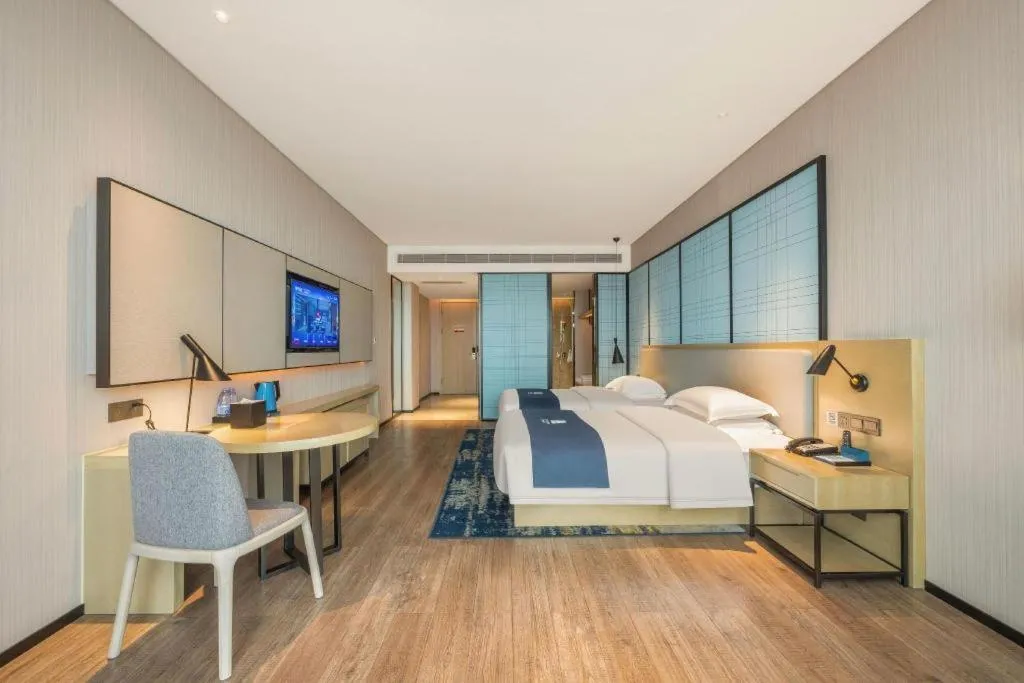 Bed in Echarm Hotel Fangchenggang Qisha