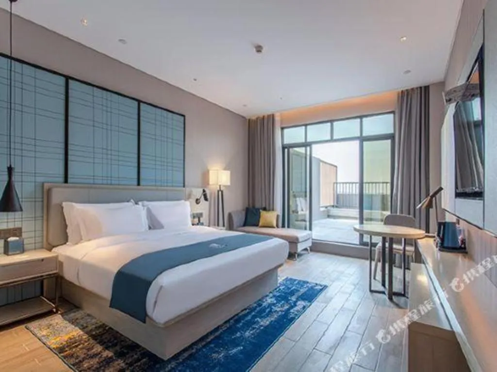 Bed in Echarm Hotel Fangchenggang Qisha