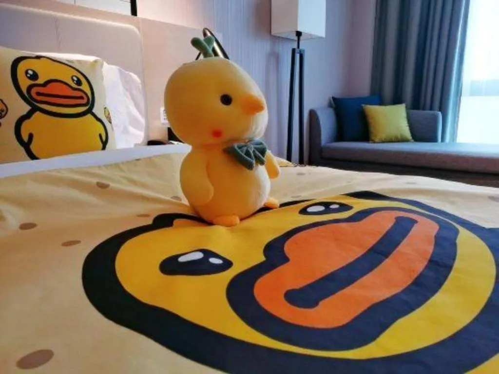 Bed in Echarm Hotel Fangchenggang Qisha