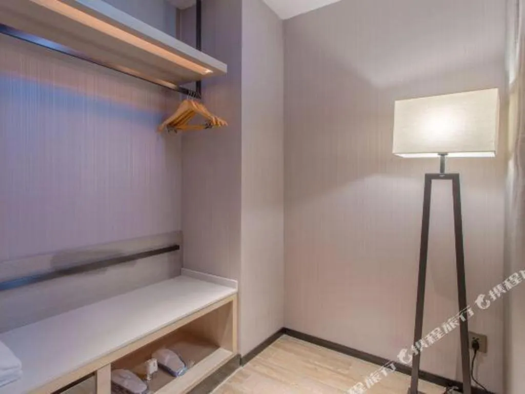 Bed in Echarm Hotel Fangchenggang Qisha