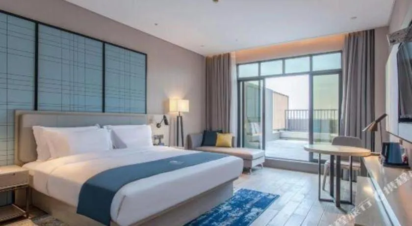 Bed in Echarm Hotel Fangchenggang Qisha