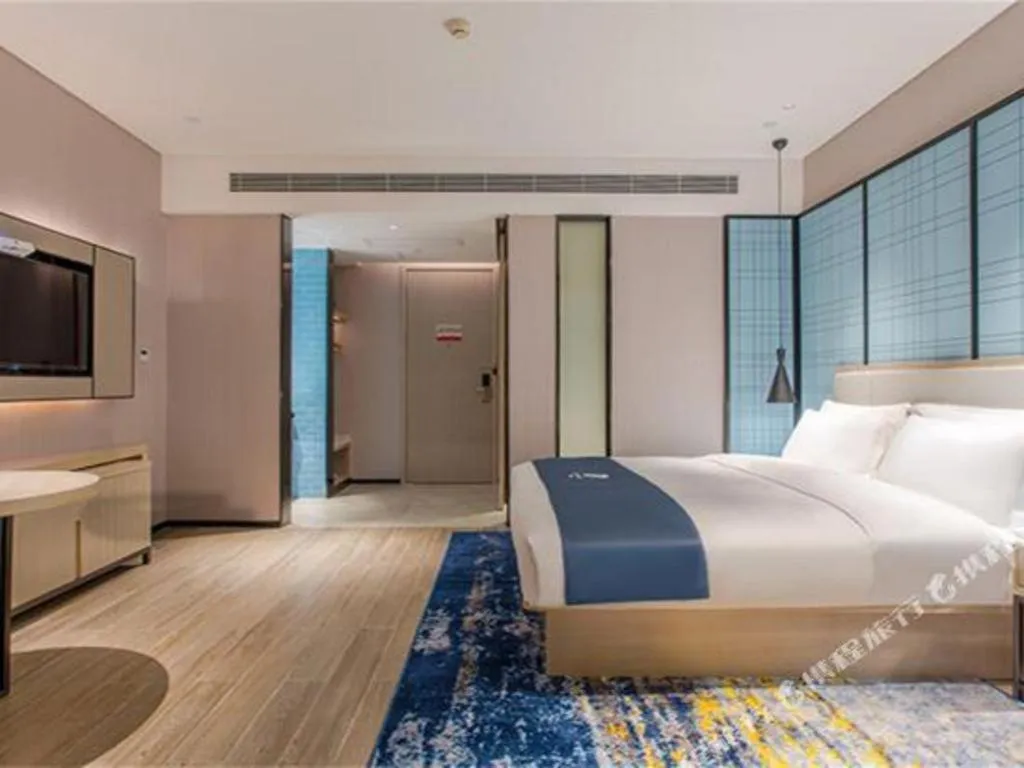 Bed in Echarm Hotel Fangchenggang Qisha