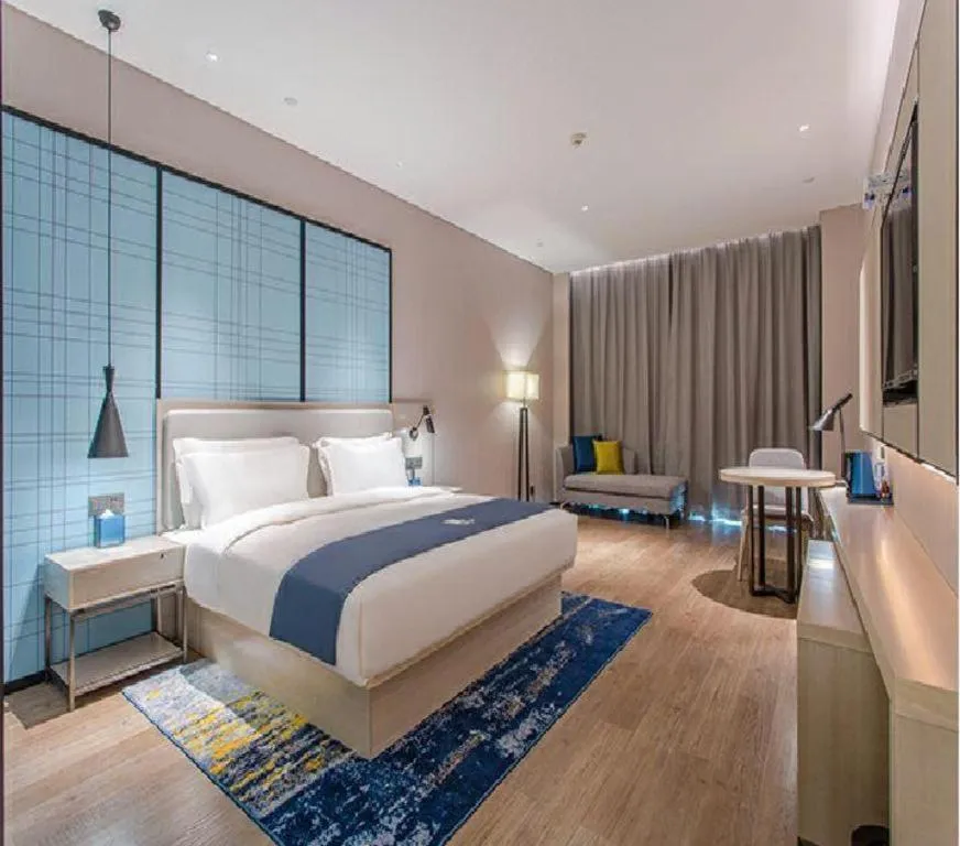 Bed in Echarm Hotel Fangchenggang Qisha