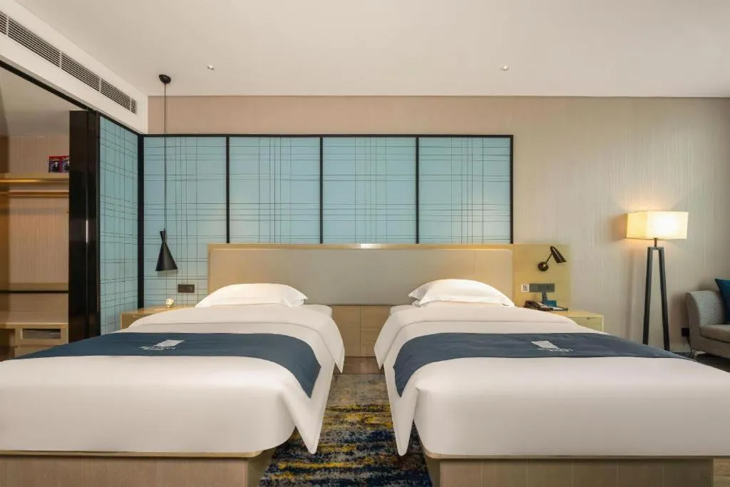 Bed in Echarm Hotel Fangchenggang Qisha