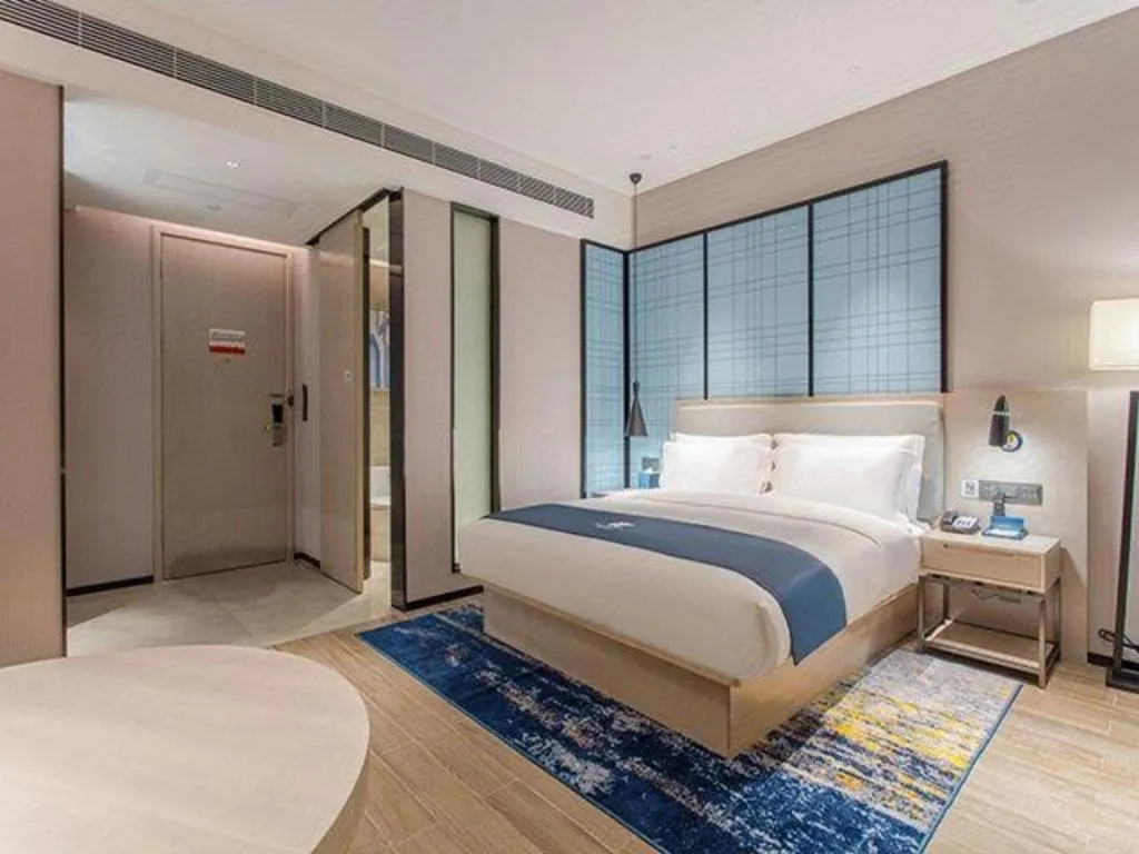 Bed in Echarm Hotel Fangchenggang Qisha