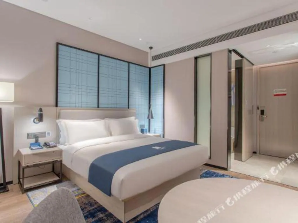 Bed in Echarm Hotel Fangchenggang Qisha