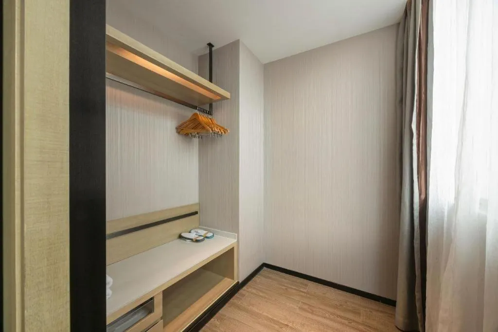 Bed in Echarm Hotel Fangchenggang Qisha