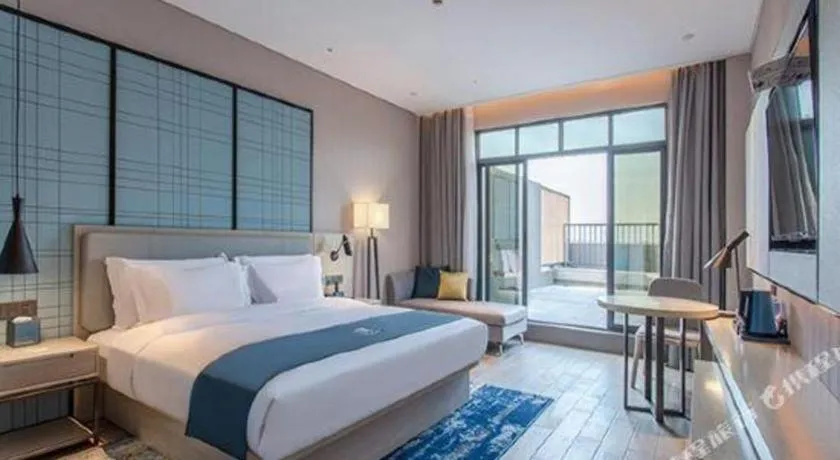 Bed in Echarm Hotel Fangchenggang Qisha