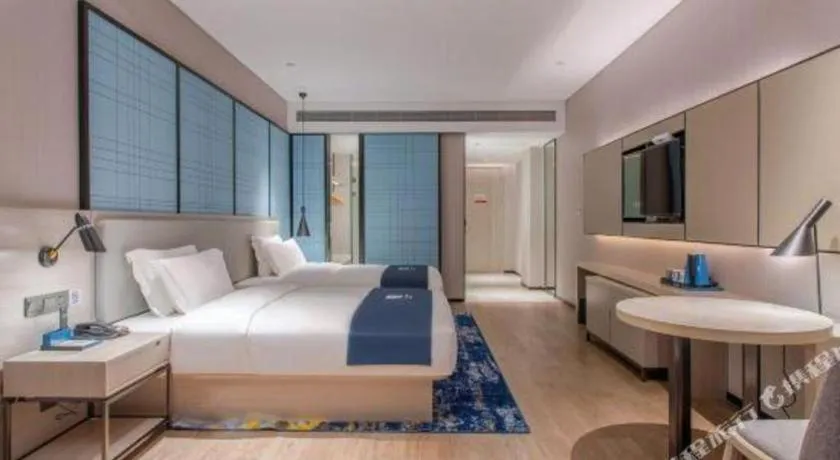 Bed in Echarm Hotel Fangchenggang Qisha