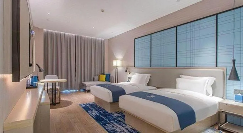 Bed in Echarm Hotel Fangchenggang Qisha