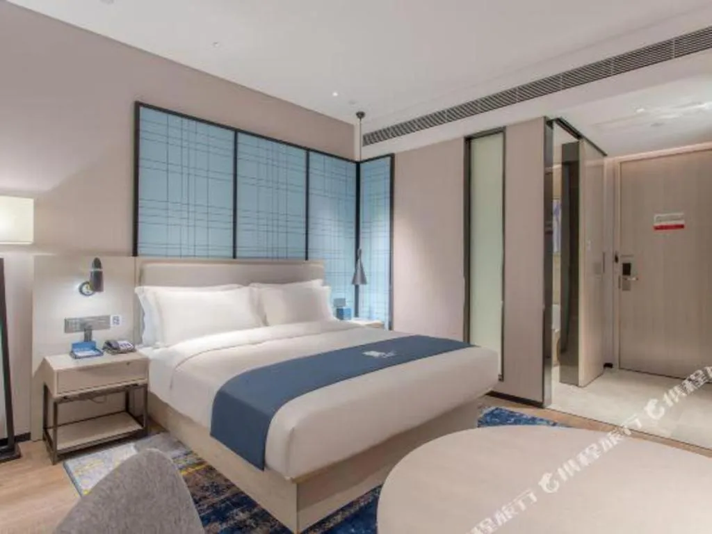 Bed in Echarm Hotel Fangchenggang Qisha