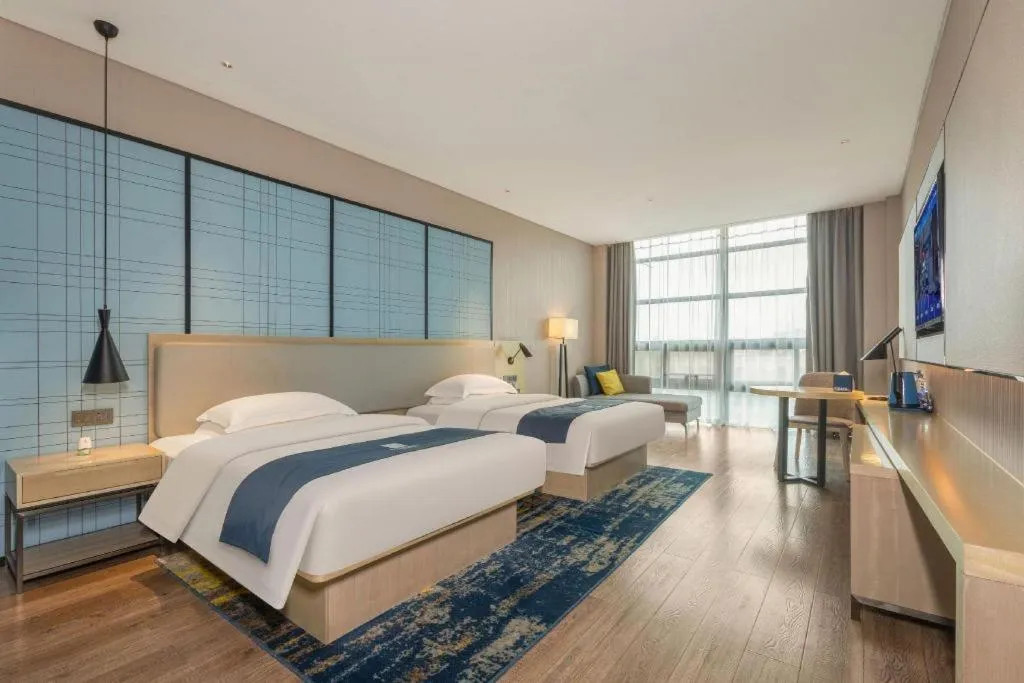 Bed in Echarm Hotel Fangchenggang Qisha