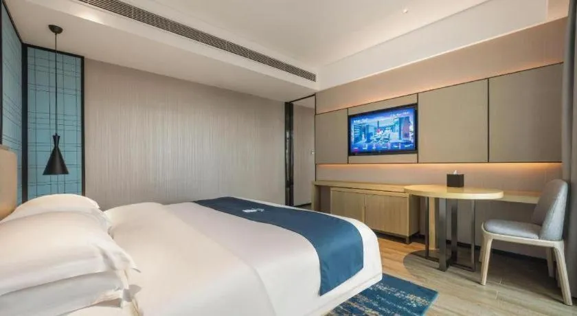 Bed in Echarm Hotel Fangchenggang Qisha