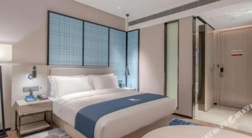 Bed in Echarm Hotel Fangchenggang Qisha