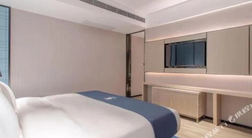 Bed in Echarm Hotel Fangchenggang Qisha