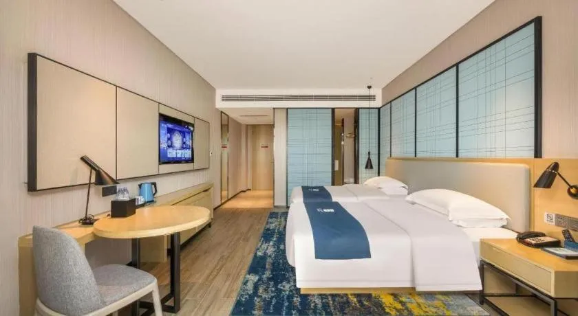 Bed in Echarm Hotel Fangchenggang Qisha