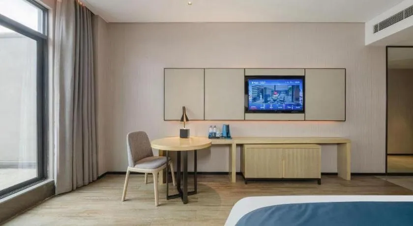 Bed in Echarm Hotel Fangchenggang Qisha