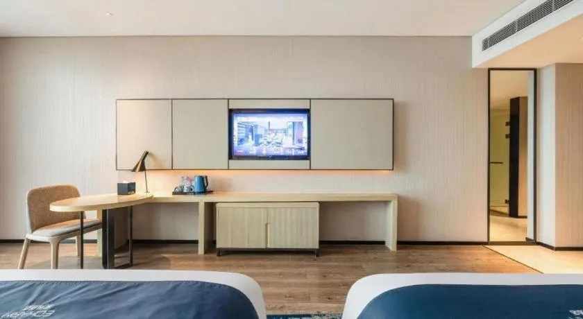 Bed in Echarm Hotel Fangchenggang Qisha