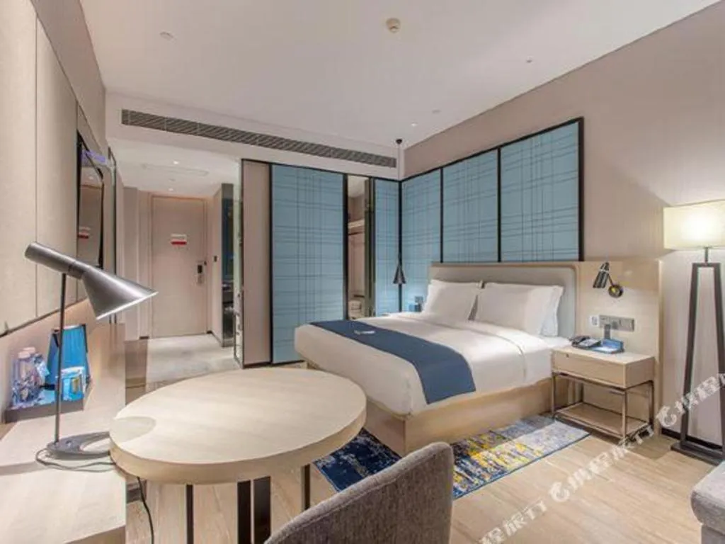 Bed in Echarm Hotel Fangchenggang Qisha