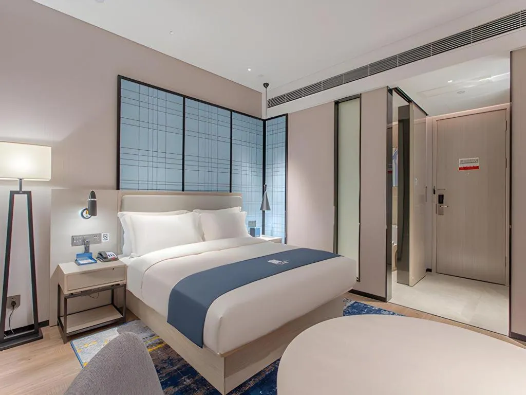 Bed in Echarm Hotel Fangchenggang Qisha