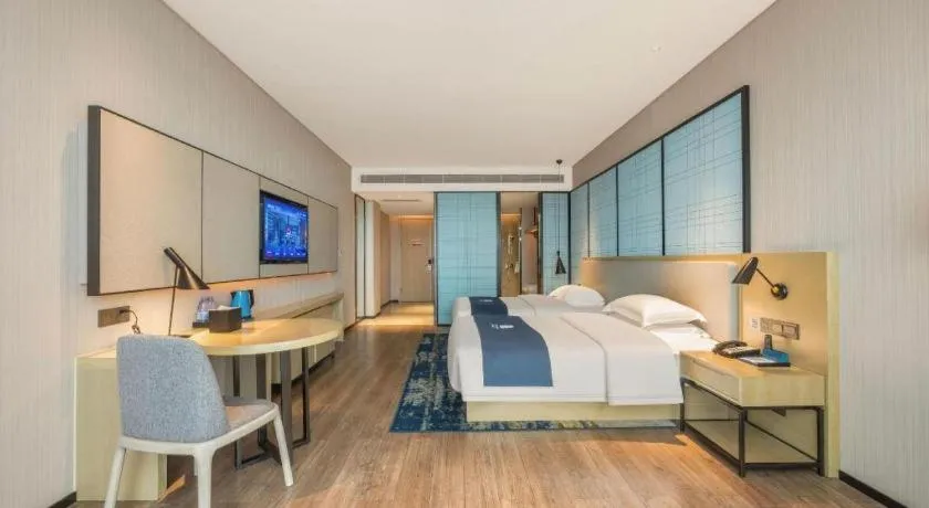 Bed in Echarm Hotel Fangchenggang Qisha