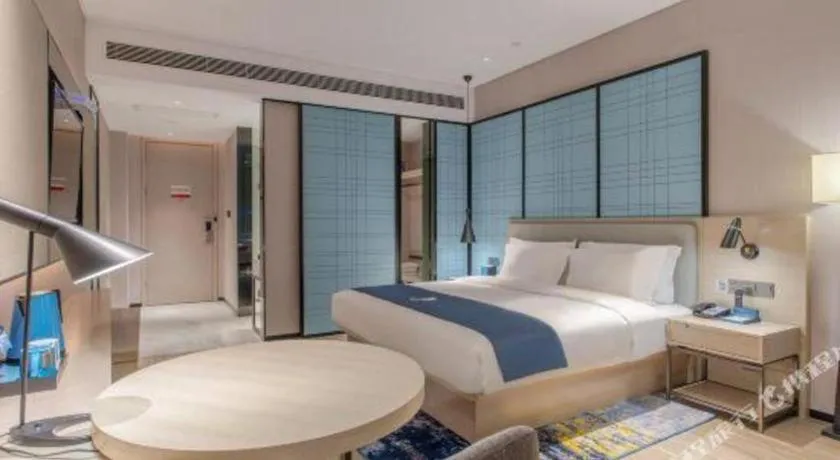 Bed in Echarm Hotel Fangchenggang Qisha