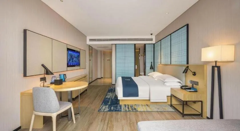 Bed in Echarm Hotel Fangchenggang Qisha