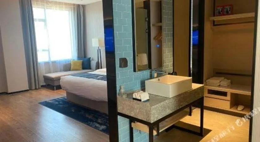 Bed in Echarm Hotel Fangchenggang Qisha