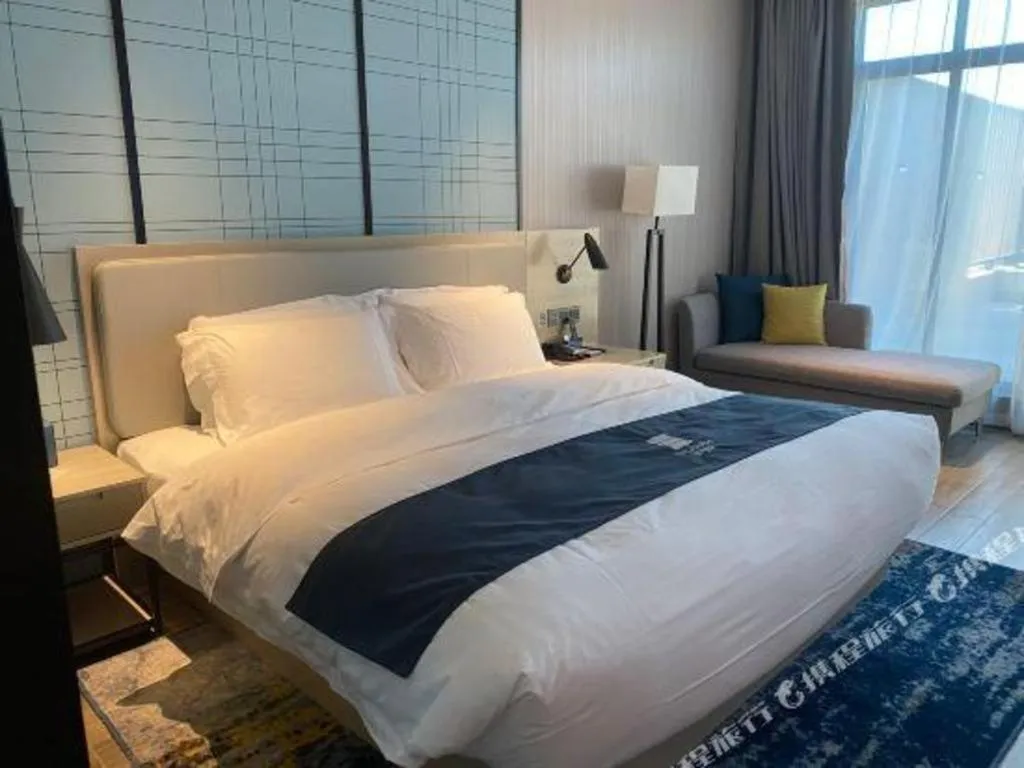 Bed in Echarm Hotel Fangchenggang Qisha