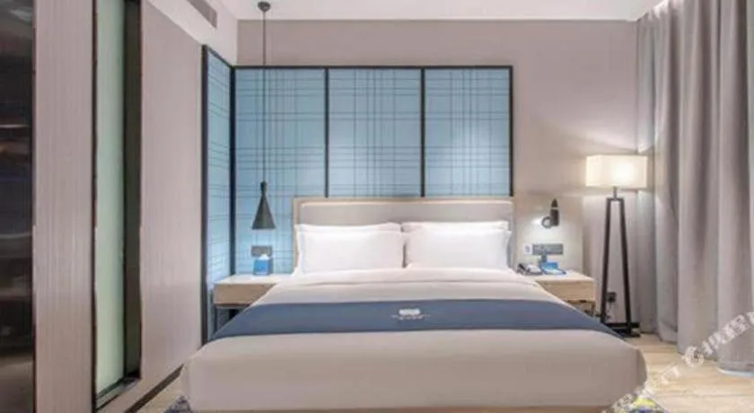 Bed in Echarm Hotel Fangchenggang Qisha