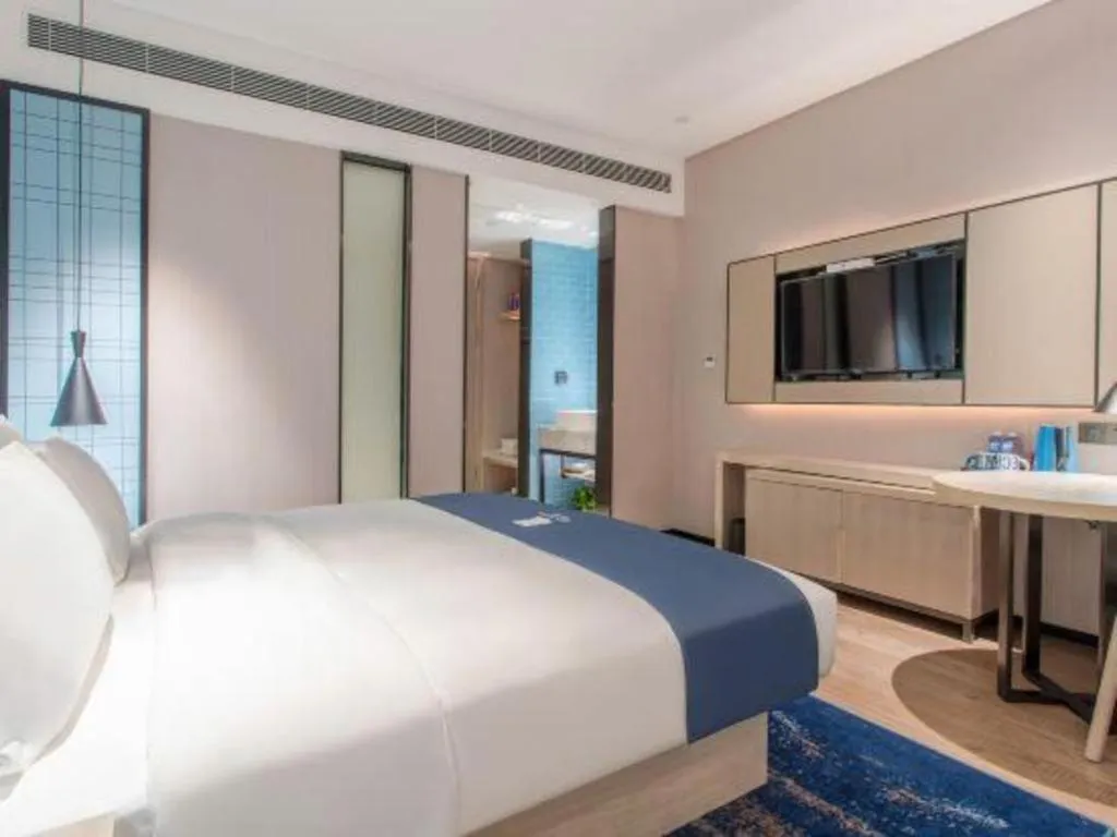 Bed in Echarm Hotel Fangchenggang Qisha