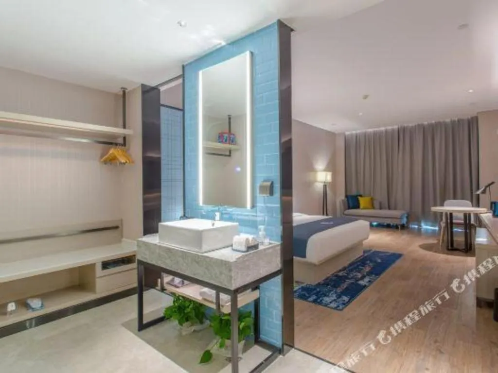 Bed in Echarm Hotel Fangchenggang Qisha