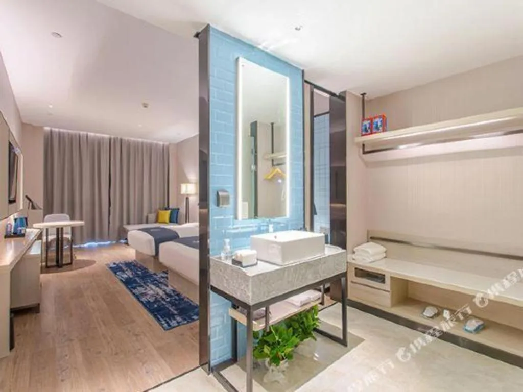 Bed in Echarm Hotel Fangchenggang Qisha